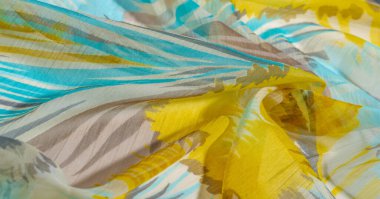 doku arkaplan deseni. Renkli dantelli ipek kumaş. Sarı mavi ve gri-mavi gözlükler. Dizaynınız, aksanınız, duvar kağıtlarınız, posterleriniz ve kartpostallarınız için mükemmel. Olasılıkların sonsuz.