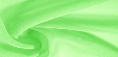 doku arkaplan deseni. İnce bir mat parıltısı olan yeşil ipek kumaş. Dizaynınız, aksanınız, duvar kağıtlarınız, posterleriniz ve kartpostallarınız için mükemmel..