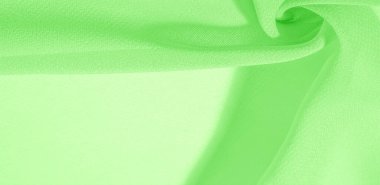 doku arkaplan deseni. İnce bir mat parıltısı olan yeşil ipek kumaş. Dizaynınız, aksanınız, duvar kağıtlarınız, posterleriniz ve kartpostallarınız için mükemmel..