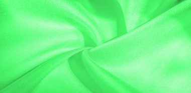 Doku, arka plan, desen, yeşil renk ipek kumaş. Bu ipek inanılmaz derecede zarif. Bu yapılan projeler uzun bir süre sürecek ve hala oldukça iyi durumda olacak.