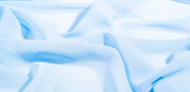 doku arkaplan deseni. Mavi ipek kumaş. Hafif bir yapay ipek kumaş. Dupioni kumaşı. Tasarımınız, aksanınız, duvar kağıtlarınız, posterleriniz ve kartlarınız için mükemmel..