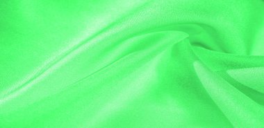 Doku, arka plan, desen, yeşil renk ipek kumaş. Bu ipek inanılmaz derecede zarif. Bu yapılan projeler uzun bir süre sürecek ve hala oldukça iyi durumda olacak.