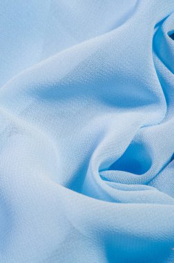 doku arkaplan deseni. Mavi ipek kumaş. Hafif bir yapay ipek kumaş. Dupioni kumaşı. Tasarımınız, aksanınız, duvar kağıtlarınız, posterleriniz ve kartlarınız için mükemmel..