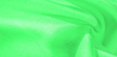 Doku, arka plan, desen, yeşil renk ipek kumaş. Bu ipek inanılmaz derecede zarif. Bu yapılan projeler uzun bir süre sürecek ve hala oldukça iyi durumda olacak.