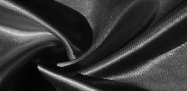 Doku, arkaplan, desen, siyah ipekten kumaş. Bu sevimli, yumuşak ve parlak kumaşın pürüzsüz bir vizon yüzeyi var. Projelerinizi yaratmak için mükemmel..