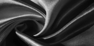 Doku, arkaplan, desen, siyah ipekten kumaş. Bu sevimli, yumuşak ve parlak kumaşın pürüzsüz bir vizon yüzeyi var. Projelerinizi yaratmak için mükemmel..