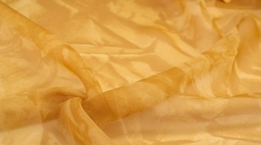 Sarı ipek kumaş dokusu. Tasarımınız, giysileriniz ve posterleriniz için de mükemmel. Güzel proje aksanlarıyla yaratıcı ol..