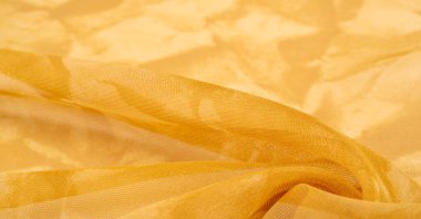 Sarı ipek kumaş dokusu. Tasarımınız, giysileriniz ve posterleriniz için de mükemmel. Güzel proje aksanlarıyla yaratıcı ol..