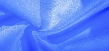 Doku, arka plan, desen, ipek mavikumaş. Krep saten arka tasarım için mükemmel bir kumaş, bir yandan bir saten bitirmek vardır, ve diğer - krep, hangi geri dönüşümlü hale getirir,