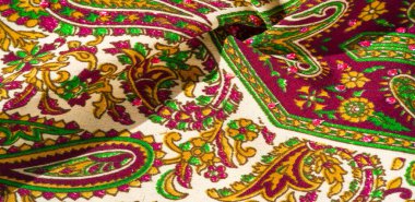 Arka plan dokusu, desen, desenli kumaş pamuk. Özgür Ruh için Kaffe Fassett tarafından tasarlanan bu büyük desenli paletin renk tonları, sıcak pembe, kobalt mavisi, fuşya ve mor ile yeşilin tonlarıdır..