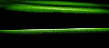 doku, arkaplan, desen. Yeşil ipek kumaş panoramik fotoğraf. İpek Dük modunda saten güzel ve asil bir ipek kumaştır. Işıl ışıl parlıyor,