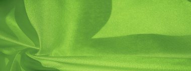 Doku, arka plan, desen, ipek yeşil kumaş. Krep saten arka tasarım için mükemmel bir kumaş, bir yandan bir saten bitirmek vardır, ve diğer - krep, hangi geri dönüşümlü hale getirir,