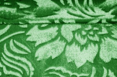 Sünnetsiz bir yığın yığının altından oyulmuş kadife kumaş desenli kadife kumaş bu tip Velvet Burntout Devore. Çiçek ve diğer desenlerde kadife süsleri olan güzel bir kumaş.