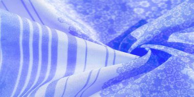 Doku, desen, beyaz arkaplanda mavi ipek kumaş, beyaz arkaplan dekoratif kursunda çiçek desenli siluet, kartpostal duvar kağıdı tasarımı. Projeniz başarılı olacak. İlham verici