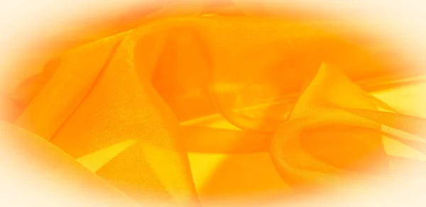 Texture of yellow silk fabric. It is also perfect for your design, clothes, posters. Be creative with beautiful project accents. This fabric is inspired by your inspiration.