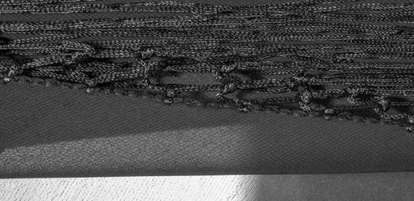丝织物的背景质感 这是一条天然的黑色围巾 用人造丝制成的漂亮的尼龙缎子 手感清澈 色彩艳丽 非常适合你的设计 — 图库照片