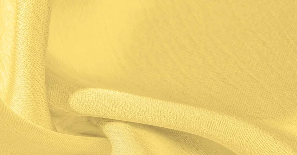 Background, pattern, texture, wallpaper, yellow silk fabric. It has a smooth matte finish. Use this luxurious fabric for anything - from design to your projects. The possibilities are truly endless!