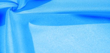 Doku, arkaplan, desen, mavi ipekten kumaş. Bu ipek inanılmaz derecede zarif. Bundan elde edilen projeler uzun süre devam edecek ve hala oldukça iyi durumda olacak..