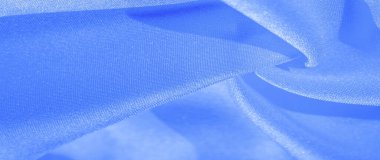 Doku, arka plan, desen, ipek mavikumaş. Krep saten arka tasarım için mükemmel bir kumaş, bir yandan bir saten bitirmek vardır, ve diğer - krep, hangi geri dönüşümlü hale getirir,