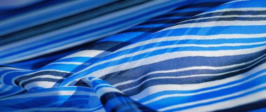 Arkaplan dokusu. çok renkli çizgili ipek kumaş. Meksika renklendirme teması soyut çizgili parlak çizgili desen