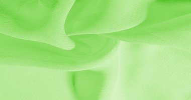 Arka plan, desen, doku, duvar kağıdı, yeşil soluk ipek kumaş parlak bir ışıltıya sahip. Bu çok yönlü bir kumaş. Tasarımının güzel aksanlarıyla yaratıcı ol..