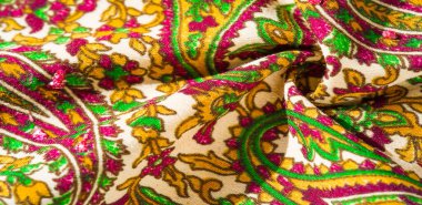 Arka plan dokusu, desen, desenli kumaş pamuk. Özgür Ruh için Kaffe Fassett tarafından tasarlanan bu büyük desenli paletin renk tonları, sıcak pembe, kobalt mavisi, fuşya ve mor ile yeşilin tonlarıdır..