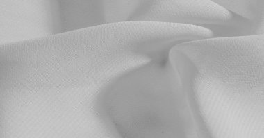 Arka plan, desen, doku, duvar kağıdı, beyaz ipek kumaş parlak bir parlaklık vardır. Bu en çok yönlü kumaştır. Tasarımınızın güzel vurgularıyla yaratıcı olun.