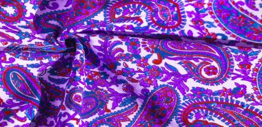 Arka plan dokusu, desen, desenli kumaş pamuk. Özgür Ruh için Kaffe Fassett tarafından tasarlanan bu büyük desenli paletin renk tonları, sıcak pembe, kobalt mavisi, fuşya ve mor ile yeşilin tonlarıdır..