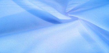 doku arka plan, model. İpek mavisi kumaş. Telio 'dan, bu organzanın ipek gazlı bezden daha ince ve keskin bir dokuması var. Bu lüks kumaşı her şey için kullan. Olasılıklar gerçekten sonsuz.!