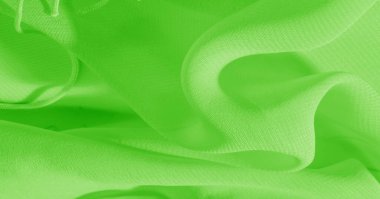 Arka plan, desen, doku, duvar kağıdı, yeşil soluk ipek kumaş parlak bir ışıltıya sahip. Bu çok yönlü bir kumaş. Tasarımının güzel aksanlarıyla yaratıcı ol..