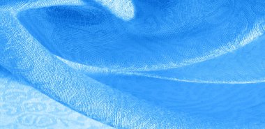 Arkaplan desenli kumaş çiçekli süs mavisi. Bu pamuk baskısı koleksiyonu parlak renkler ve şirin temalarla ayırt edilir. Herhangi bir proje, tasarım ve çevrimiçi dekor ögeleri için ideal.