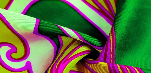 silk abstract fabric This luxurious silk chiffon fabric is a show-stopper. It is transparent has a liquid drape and is very soft. Perfect for your projects. Colors include green yellow white and pink