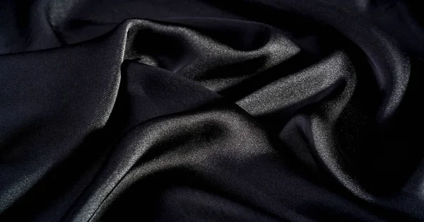 パターン テクスチャ 黒い絹の生地 どんなデザインにも高級感を加え この超柔らかく非常に軽量なポリエステルライニング生地に入れてください — ストック写真