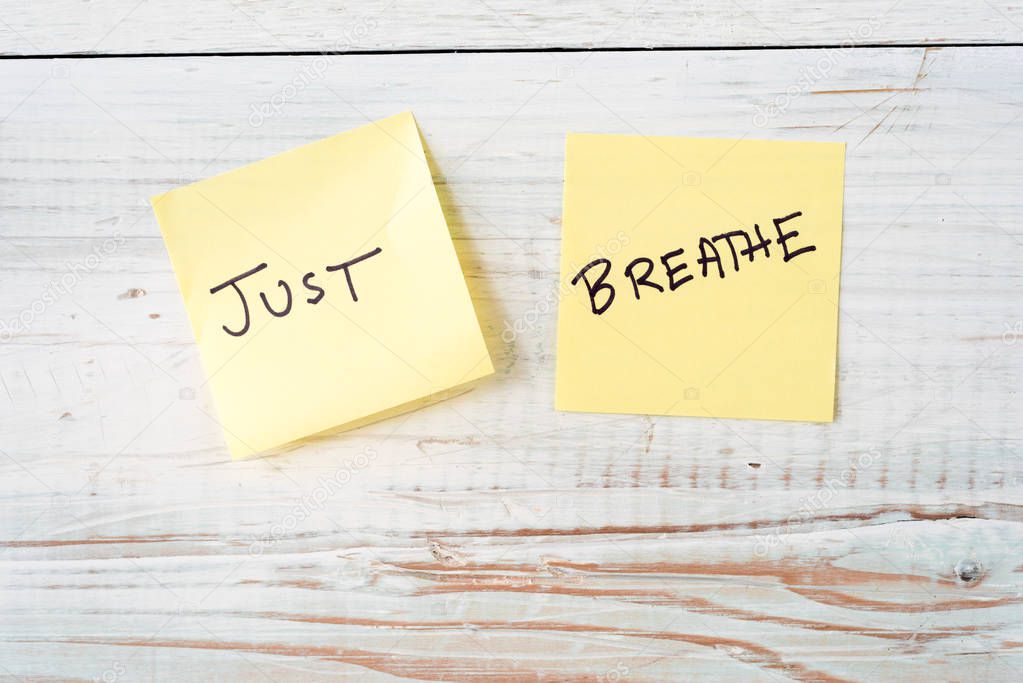Two Post It Notes with Message Just Breathe