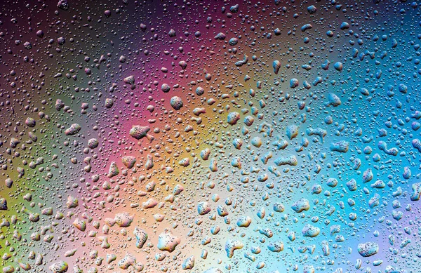 Abstract drops on a rainbow, can be used as a background. Concept, abstract art — Stockfoto