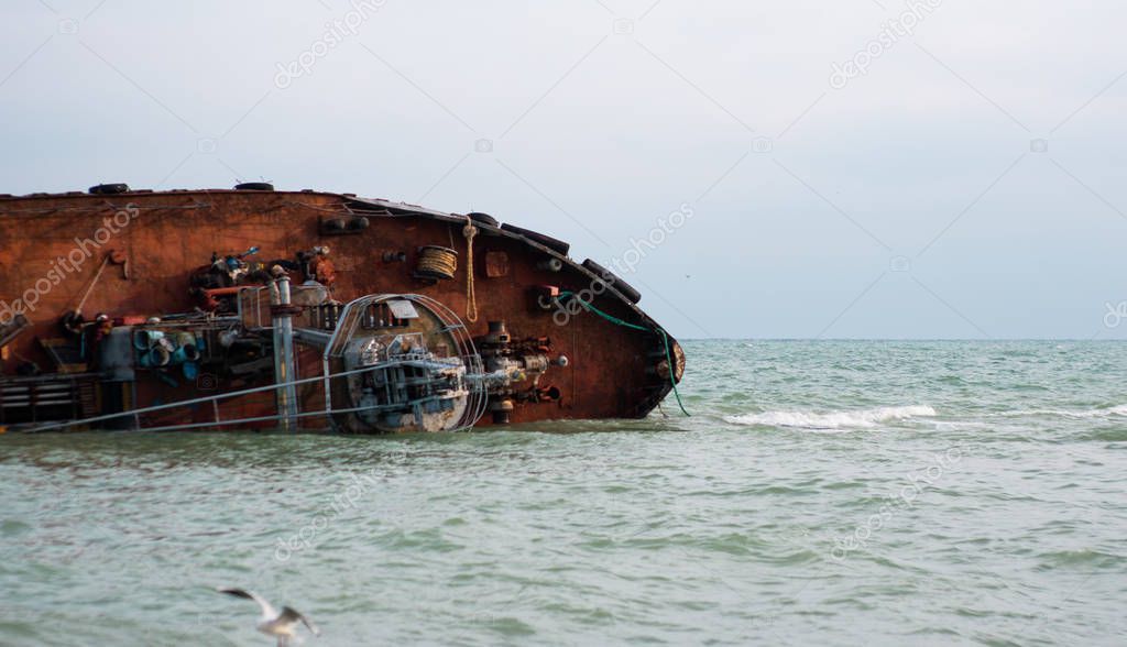 Ecological disaster. The tanker ship crashed and ran aground. Oil pollution of the sea