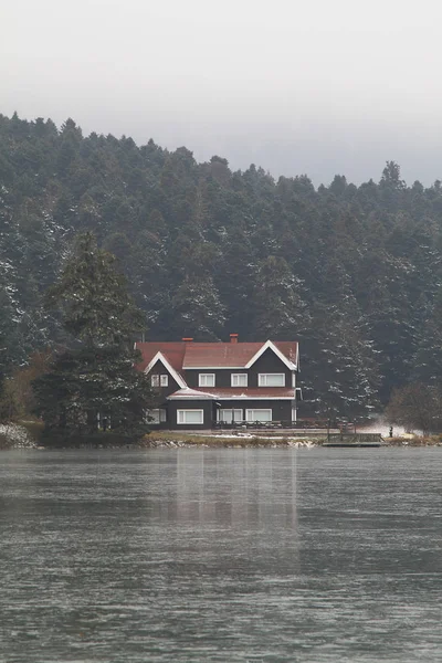 lake house coast Golcuk Lake in winter