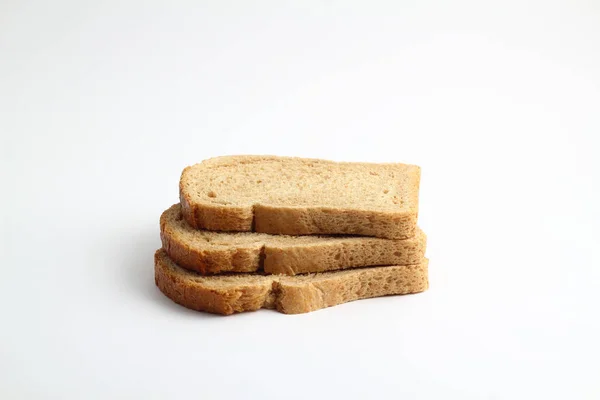 Beyaz Bir Arka Plan Üzerinde Dilimlenmiş Parçalar Ile Ekmek Beyaz — Stok fotoğraf