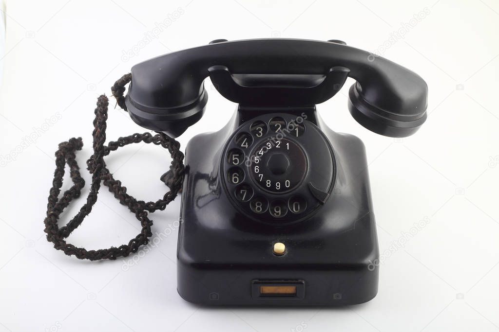 old vintage phone isolated on white background