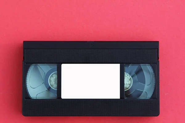 Arkaplan olarak VHS video kasetleri yığını. Eski video kasetler. Retro teknolojisi.