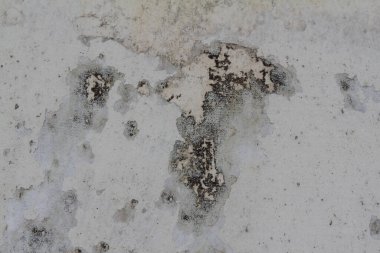 Eski gri çimento kaplı Grunge beton duvar. Tasarım dokusu arka planınız için harika. Çatlak desenli eski beton duvar çatlamış beton duvar çatlaklar ve hasarla kaplı..