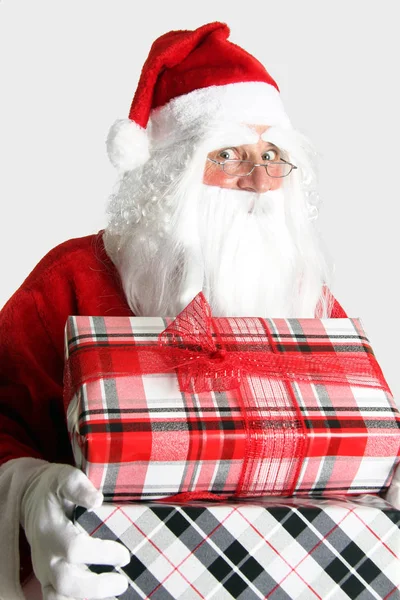 Санта Клаус з подарунками — стокове фото