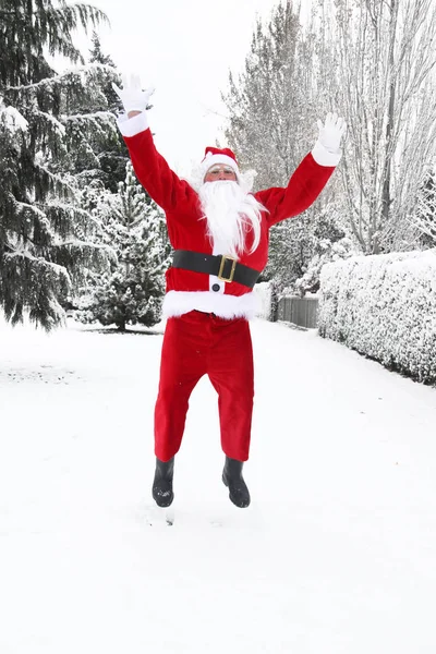 Santa claus springen — Stockfoto