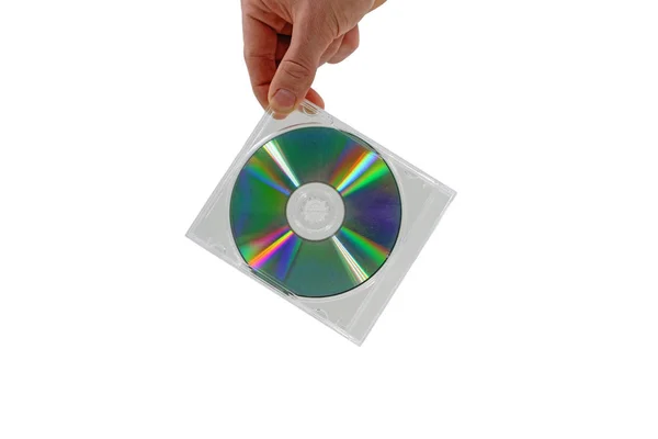 Мужская рука держит компакт-диск с прозрачным корпусом на белом фоне — стоковое фото