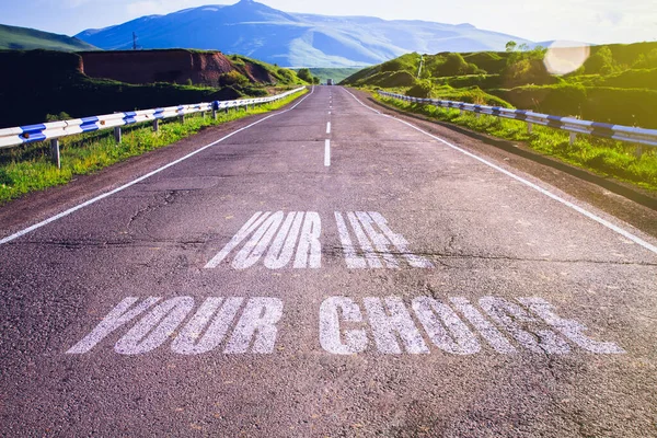 Your life your choice written on asphalt