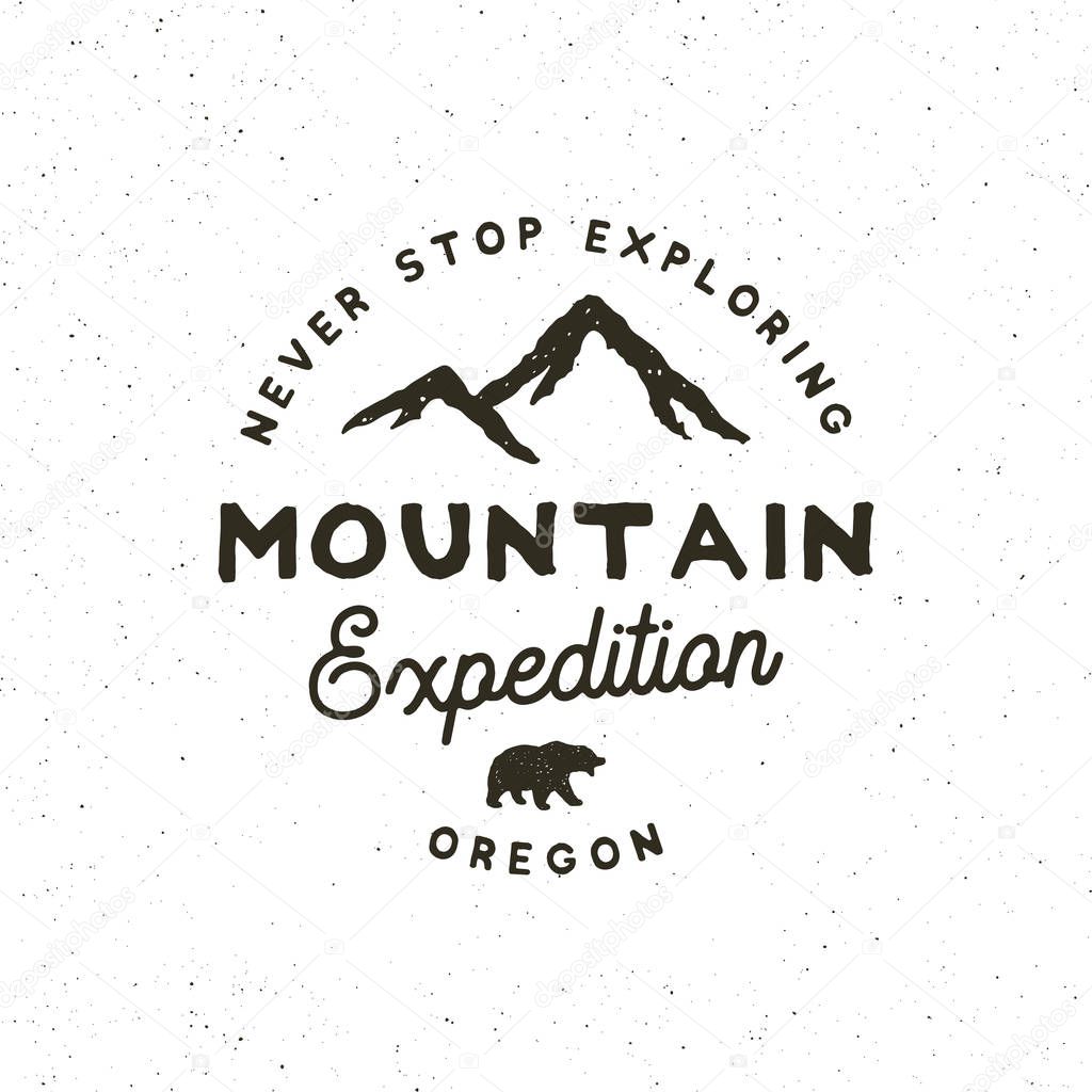 Vintage wilderness logo. hand drawn retro styled outdoor adventure emblem, badge, design elements, logotype template. vector illustration