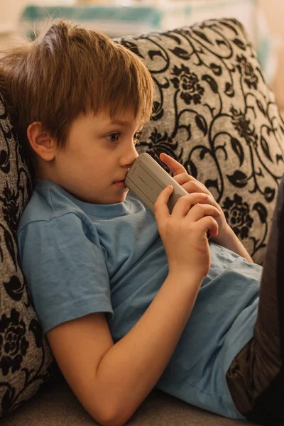 Boy Lies Couch Watching Misses Home Insulation Indoors — Stock Photo, Image