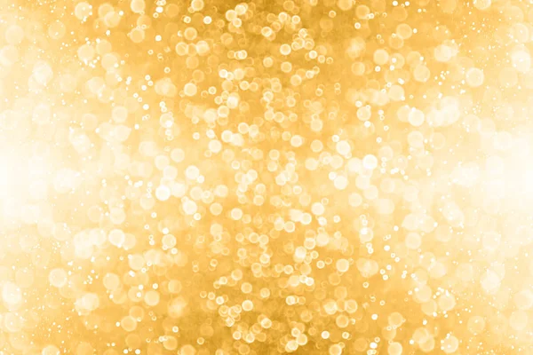 Brillo de oro abstracto y fondo de chispa dorada — Foto de Stock