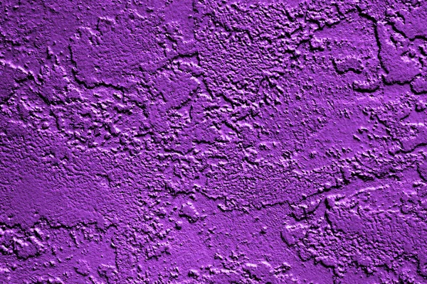 怪异的万圣节或狂欢节的紫色油漆墙背景纹理 — 图库照片