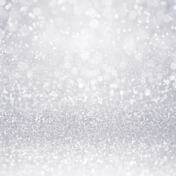記念日や光沢のあるクリスマスの銀色にキラキラ紙吹雪背景 — ストック写真